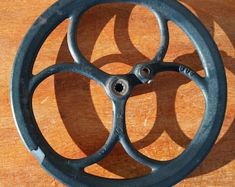 Vintage Cast Iron Wheel from a White Sewing Machine Table