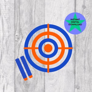 Puede incluir: Un blanco azul y naranja con tres dardos azules, sobre un fondo de madera blanca. El texto "INSTANT DIGITAL DOWNLOAD" está en una estrella verde.