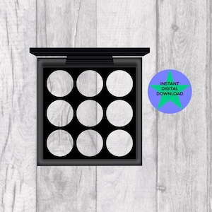 May include: Black eyeshadow palette with nine circular compartments. The palette has a black lid and a white background.