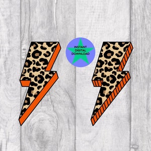 Puede incluir: Dos diseños de rayos naranja y negro con un patrón de estampado de leopardo. Los rayos están delineados en naranja.