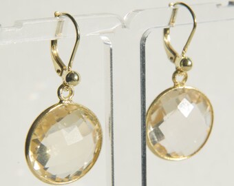 golden earrings with round citrine