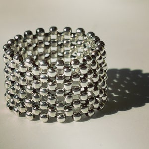 Flexible ring in sterling silver made of silver balls