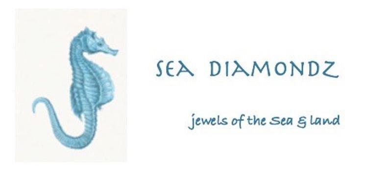 May include: A blue seahorse illustration with the text "SEA DIAMONDZ jewels of the sea & land".