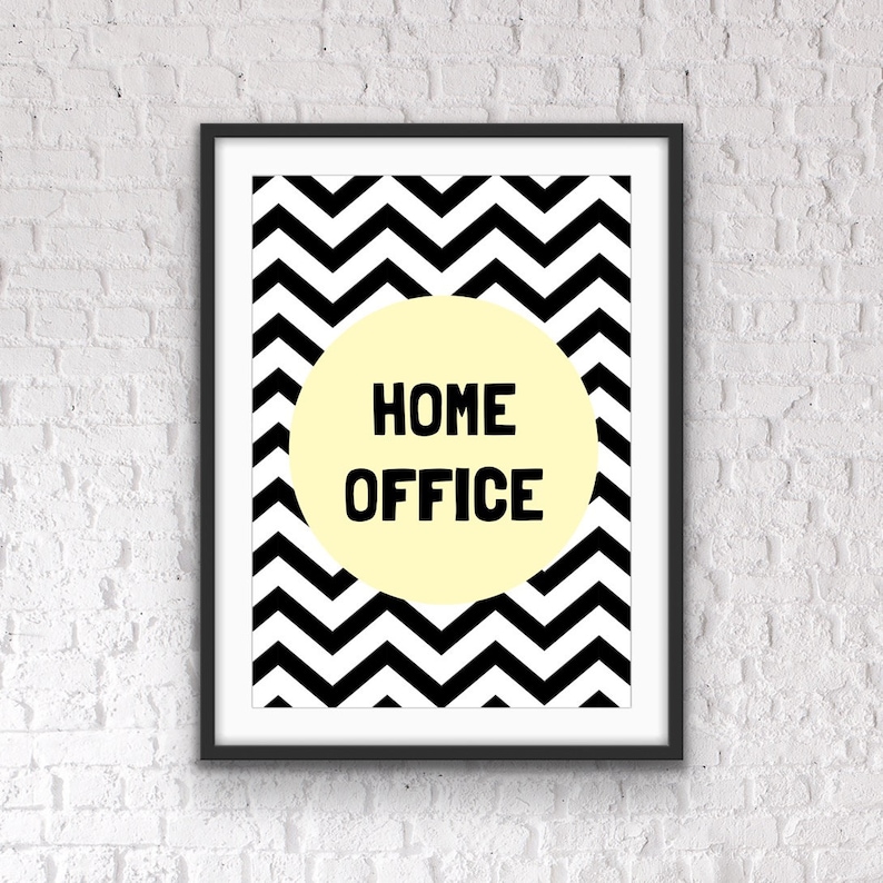 May include: Black and white chevron pattern print with a yellow circle in the center. The circle has the text "HOME OFFICE" in black.