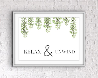 Puede incluir: Impresión enmarcada en blanco con un diseño de vid verde frondoso y el texto "Relax & Unwind" en negro.