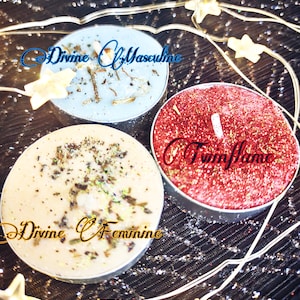 May include: Three round candles with glitter on top. The candles are labeled "Divine Masculine", "Twin Flame", and "Divine Feminine".