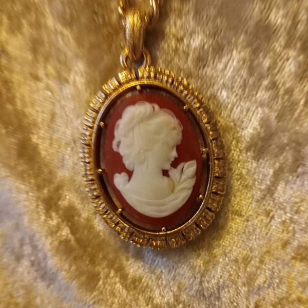 Lovely lady cameo mounted on carnelian cabochon in ornate gold frame with heavy gold chain