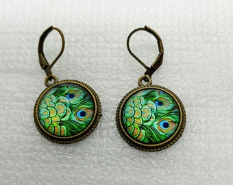 Glass cabochon peacock feathers drop earrings set in antique gold lever back or hook