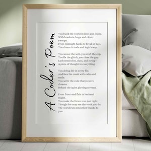 May include: A framed print with a light wood frame. The print features the text "A Coder's Poem" in a script font, with a poem about coding in a black serif font. The background is white.