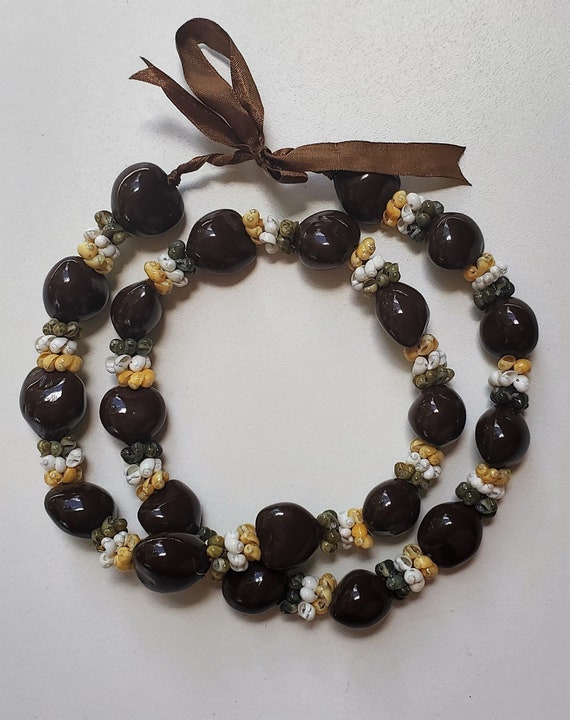 Kukui shell necklace deals
