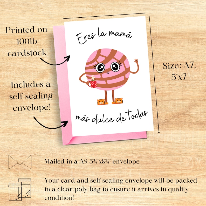 May include: A7 greeting card, 5x7 inches, with a cartoon concha character holding a mug. The card reads "Eres la mam&aacute; m&aacute;s dulce de todas" in black script on a white background, with a pink envelope.