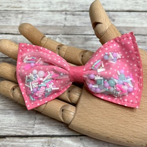 Christmas Hair Bow. | Christmas Shaker Bow. | Pink Christmas Shaker Bow. | Festive Shaker Hair Bow. | Holiday Shaker Hair Bow. |
