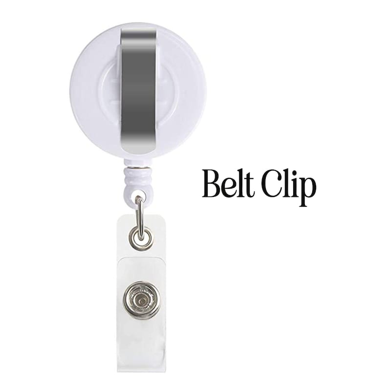 May include: A white retractable badge holder with a silver metal belt clip and a clear plastic snap-on badge holder. The text "Belt Clip" is printed in black.