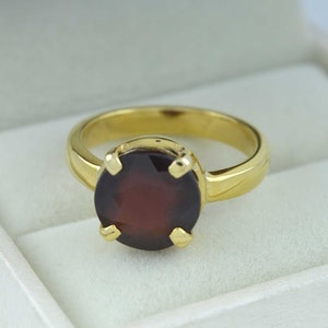 Natural hessonite garnet (gomed) gemstone ring in panchdhatu metal for vedic astrology mars planet january birthstone