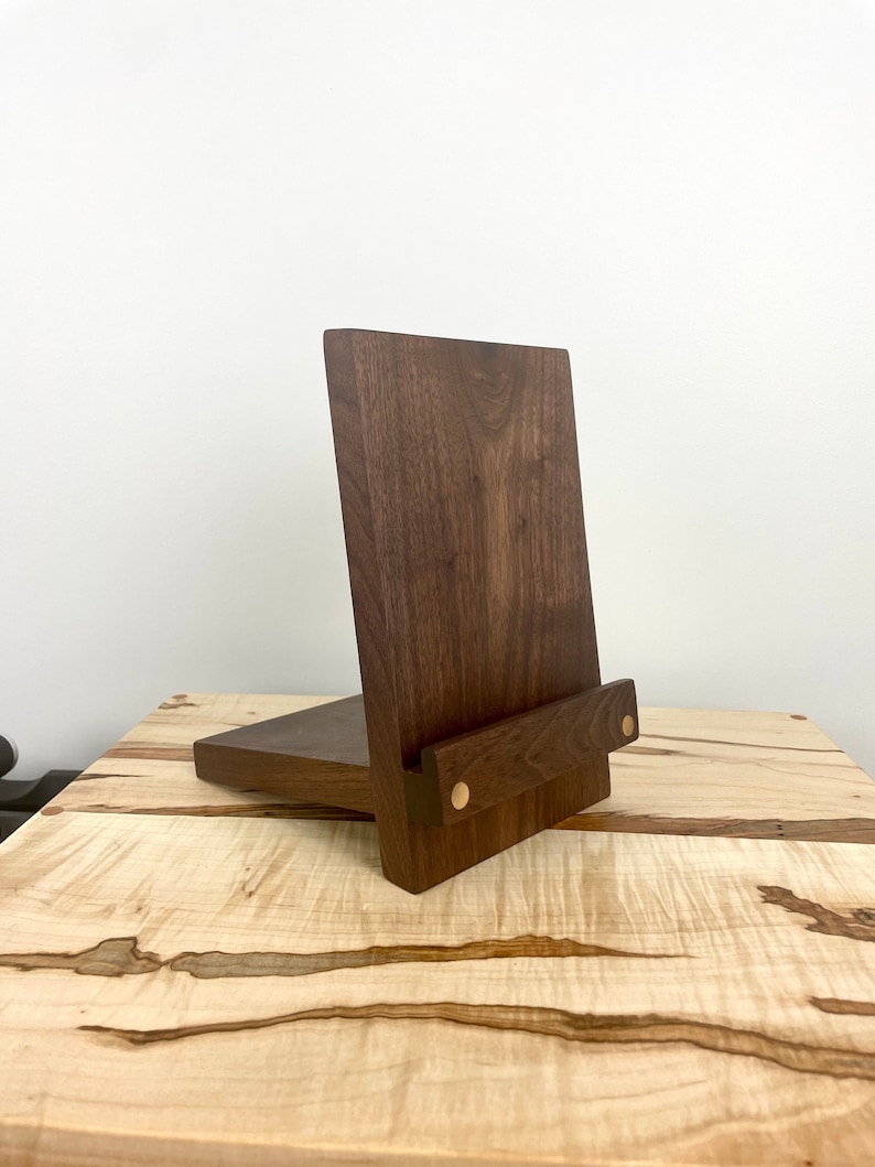 Now spinning record display. Solid hardwood walnut on deck vinyl display