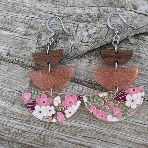 Pink flower dangle earrings.