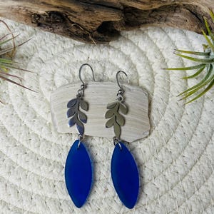 Blue sea glass dangle earrings.