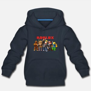 May include: A dark blue hooded sweatshirt with the word "ROBLOX" in red letters on the front. The graphic features a group of cartoon characters from the popular online game.