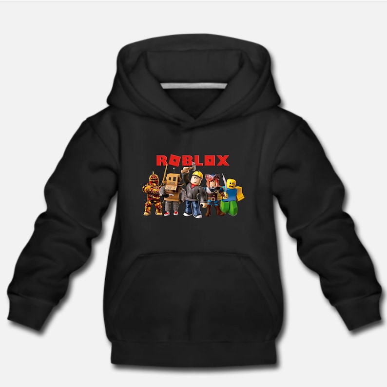 May include: Black hoodie with a red "ROBLOX" logo and a graphic of five cartoon characters. The characters are wearing different outfits and holding various items.