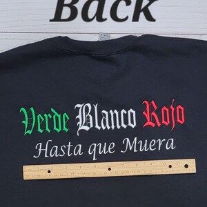 May include: Black sweatshirt with the text "Verde Blanco Rojo Hasta que Muera" embroidered in green, white, and red.