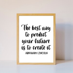 Puede incluir: Una impresión enmarcada con una cita de Abraham Lincoln: "La mejor manera de predecir tu futuro es crearlo."