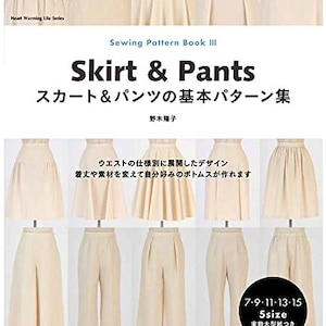 May include: A book titled "Skirt & Pants" with the Japanese text "スカート&パンツの基本パターン集" and the author's name "野木陽子". The book cover features illustrations of various skirts and pants in a light beige color.