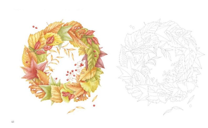 May include: A watercolor illustration of a wreath made of autumn leaves in shades of red, orange, yellow, and green. The wreath is surrounded by small red berries. A black and white outline of the wreath is shown on the right side of the image.
