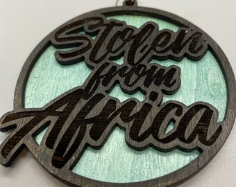 Stolen From Africa Earrings (Black on Teal)