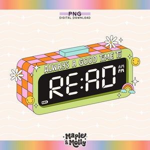 May include: A green and pink checkered alarm clock with a digital display that reads "RE:AD" and the text "ALWAYS A GOOD TIME TO". The clock has a rainbow and smiley face stickers.
