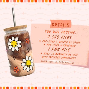 May include: A brown and white tumbler with a smiling daisy design. The tumbler has a wooden lid and a clear straw. The text "DETAILS" is visible in the background.