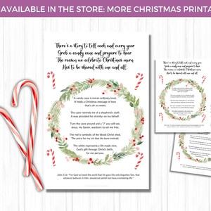 May include: Christmas-themed printable art featuring a poem about the meaning of a candy cane, with a wreath illustration and candy cane accents. The text includes the phrase "NOW AVAILABLE IN THE STORE: MORE CHRISTMAS PRINTABLES."