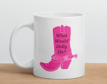 May include: White ceramic mug with a pink cowboy boot graphic and the text "What Would Dolly Do?"