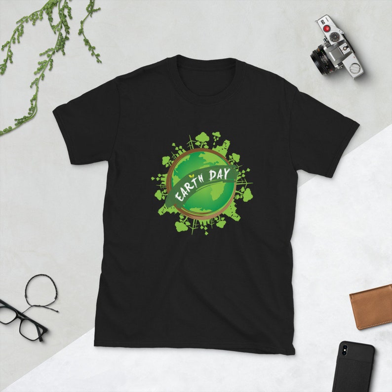 May include: Black t-shirt with a green graphic of the Earth with the text "Earth Day" on it.