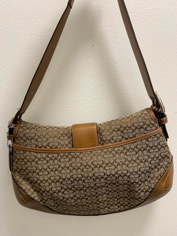 Coach signature handbag.