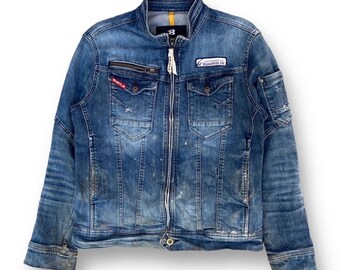 Chaqueta motera vaquera desgastada estilo años 2000, talla L, con cremallera completa, múltiples bolsillos.