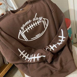 Glittery game day football sweatshirt