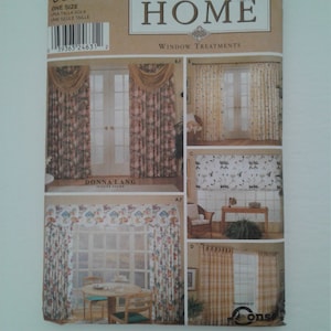May include: Simplicity Home window treatment sewing pattern number 9606. The pattern includes instructions for making four different window treatments: a swag valance, a ruffled valance, a roman shade, and a pair of curtains. The pattern is designed by Donna Lang Interior Design.