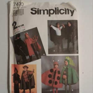 May include: Simplicity sewing pattern number 7470 for making children's Halloween costumes. The pattern includes instructions for making a devil, a ladybug, a dragon, a robin hood, and a vampire costume.