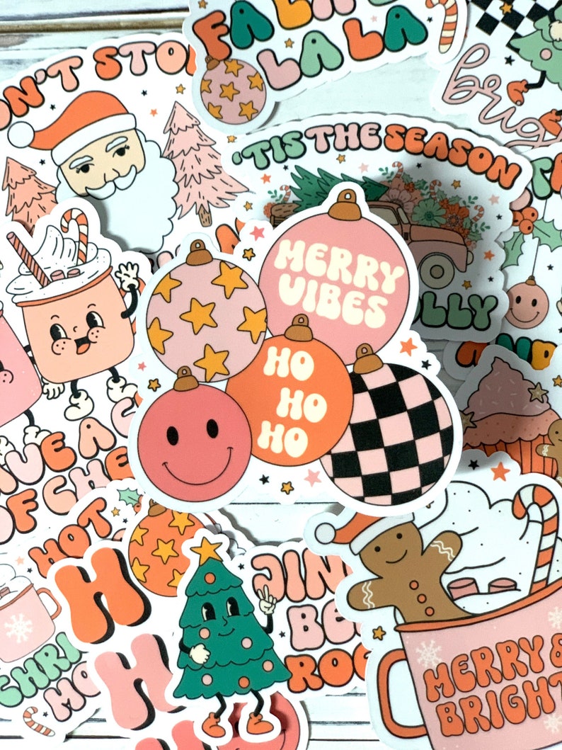May include: A collection of Christmas-themed stickers featuring various designs, including ornaments, a gingerbread man, a Christmas tree, and a mug with the text "Merry & Bright".