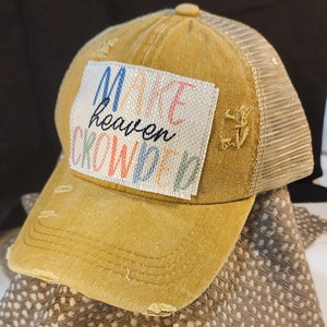 Make Heaven Crowded hat - criss cross ponytail