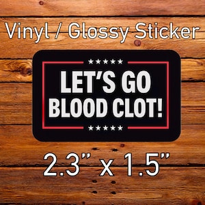 May include: Black rectangular vinyl sticker with the text "LET'S GO BLOOD CLOT!" in white, framed by a red border and stars. The sticker measures 2.3" x 1.5". The words "Vinyl / Glossy Sticker" are at the top.