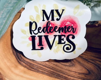 May include: White sticker with a floral design and the text "My Redeemer Lives" in black lettering.