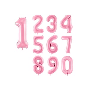 May include: Pink foil number balloons, from 1 to 0, for a birthday party or other celebration.