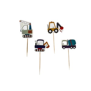 May include: Set of four construction vehicle cupcake toppers. The toppers feature a crane, a bulldozer, an excavator, and a cement mixer. The toppers are printed on cardstock and attached to wooden skewers.