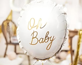 May include: White balloon with gold lettering that says "Oh Baby".