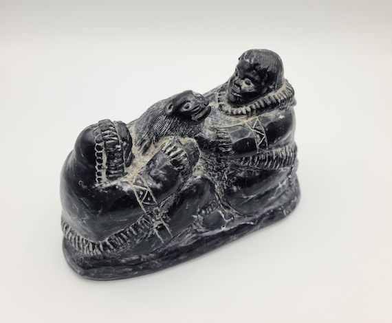 Vintage Resin Type Soapstone Casting ~ Wolf Original ~ Made In Canada ~ Inuit Native Art Craft ~ Couple Holding A Seal ~ Decorative Figurine