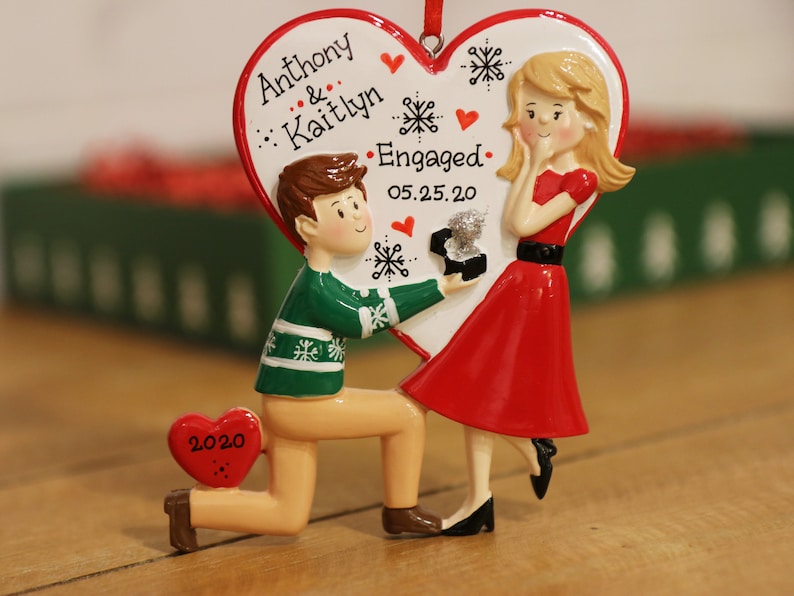 engagement	engaged couple	marry me ornament	she said yes	snowman couple	christmas ornaments	christmas gifts	engagement gift marry me ornament