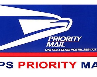 May include: A blue and red USPS Priority Mail label with a white eagle graphic and the text "PRIORITY MAIL" and "UNITED STATES POSTAL SERVICE".