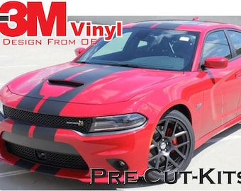 May include: A red car with black racing stripes on the bonnet and roof. The image includes the text "3M Vinyl" and "Design from OE" in red and white. The words "Pre-Cut-Kits" are also visible.