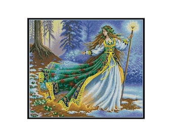 May include: A woman in a white dress with a green and gold patterned overskirt and a wreath of flowers in her hair stands in a snowy forest. She holds a staff with a star at the top and is surrounded by sparkling snowflakes.